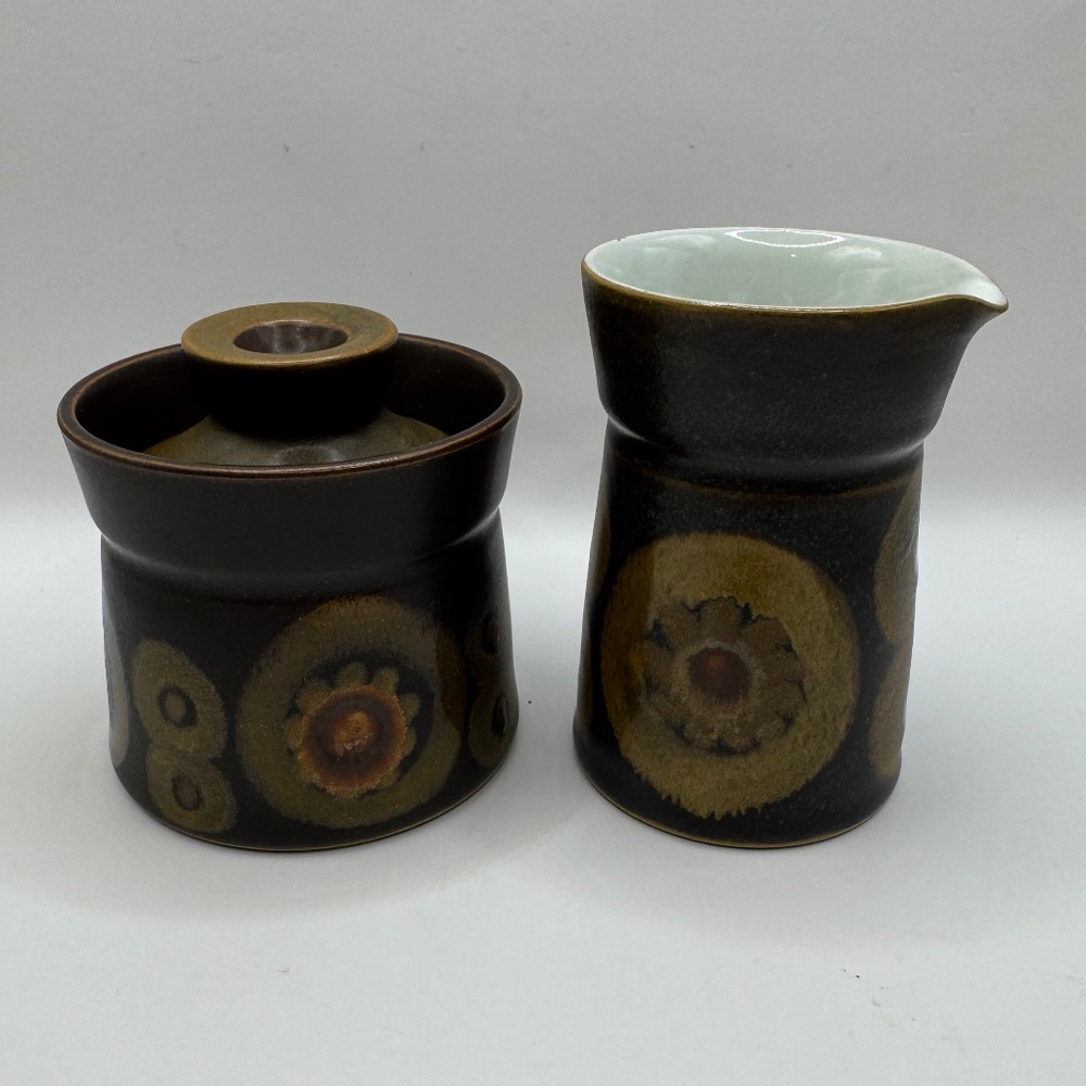 Denby Arabesque or Samarkand Cream and Sugar Bowl Set. Note chip on creamer.